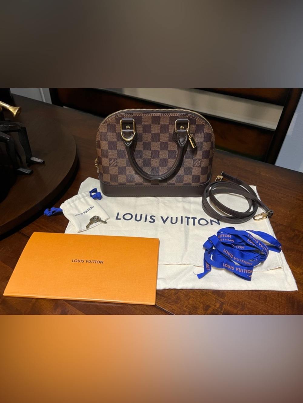 Louis Vuitton Damier Ebene Alma BB Bag in Brown